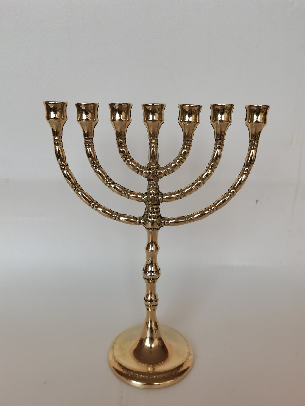 Menorah a sette bracci in ottone lucido – 24 x 19 cm