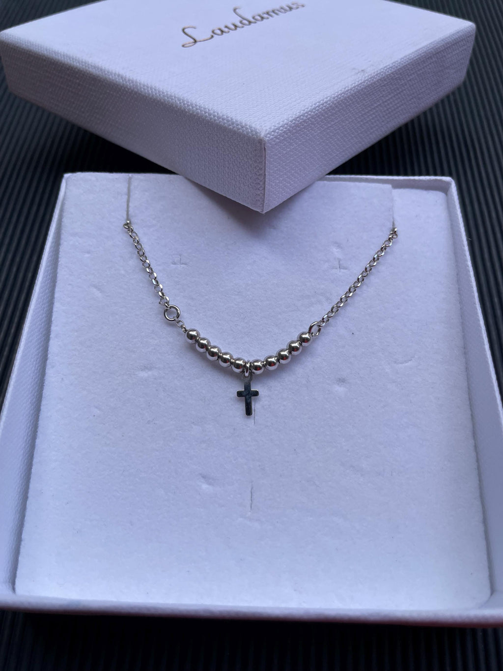 Bracciale in argento con croce e palline