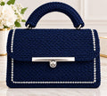 Borsa artigianale blu scuro con dettagli argento