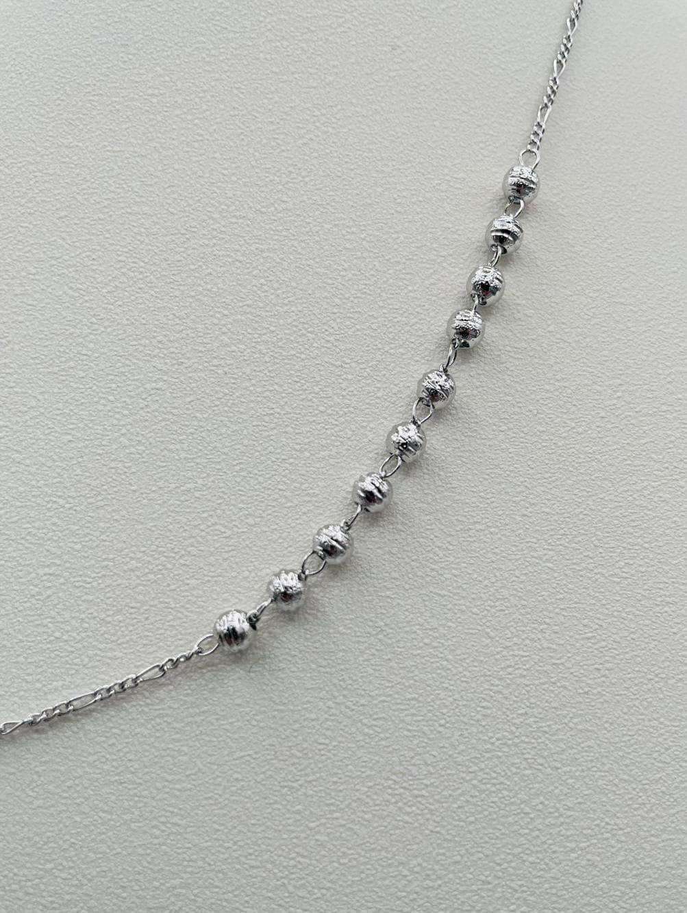 Collana stile rosario con crocifisso e medaglia sacra