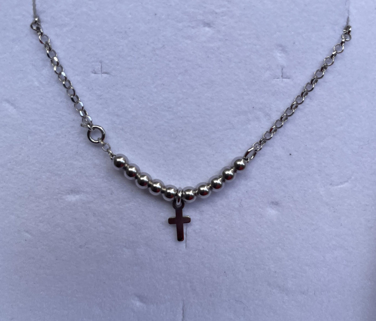 Bracciale in argento con croce e palline