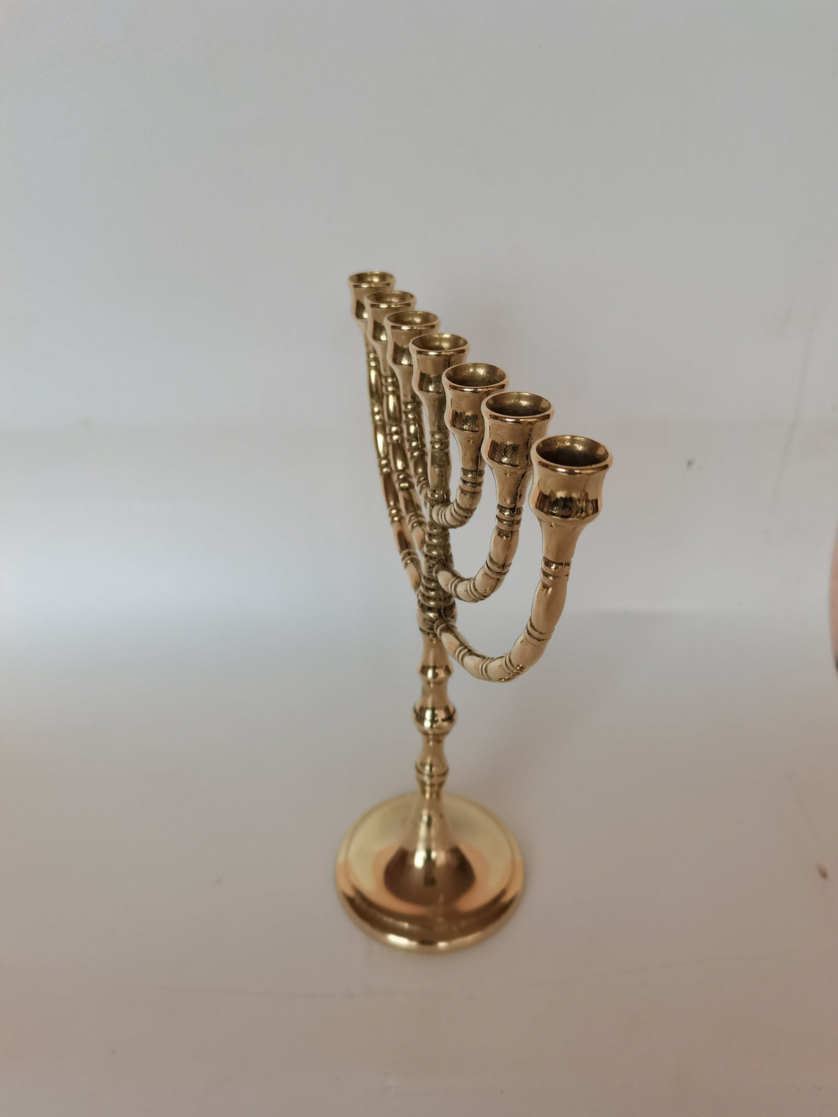 Menorah a sette bracci in ottone lucido – 24 x 19 cm