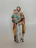Statue Heiliger Josef mit Jesuskind und Lilie aus bemaltem Kunstharz – 15 cm