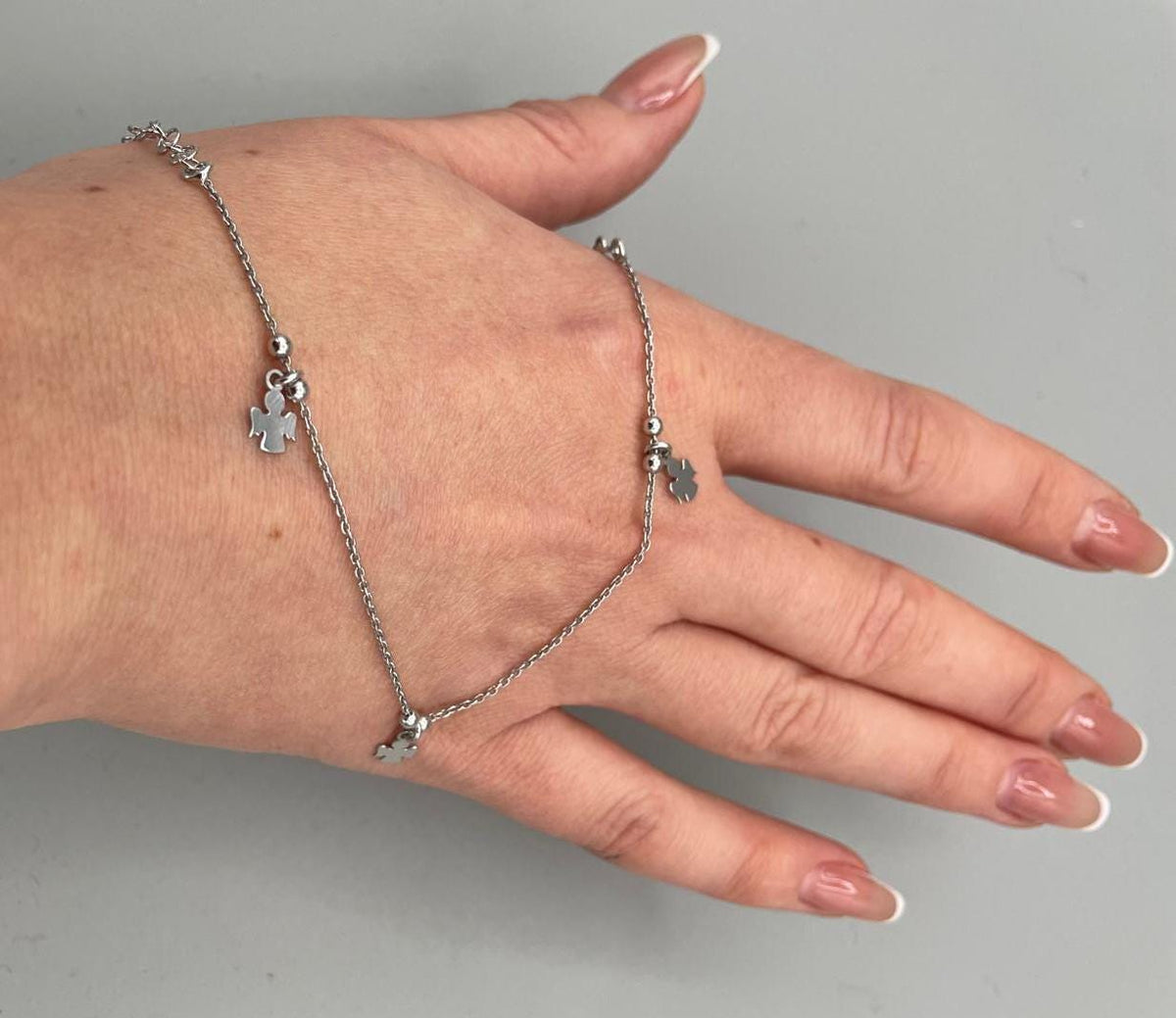 Bracciale in Argento con Tre Angeli – Gioiello Portafortuna Elegante e Simbolico
